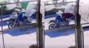 Relacionada moto-basura-camion.jpg