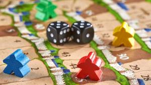 Relacionada board-game-with-chips-in-the-form-of-little-men-ten-dice-were-drawn-on-the-black-dice-photo.jpg